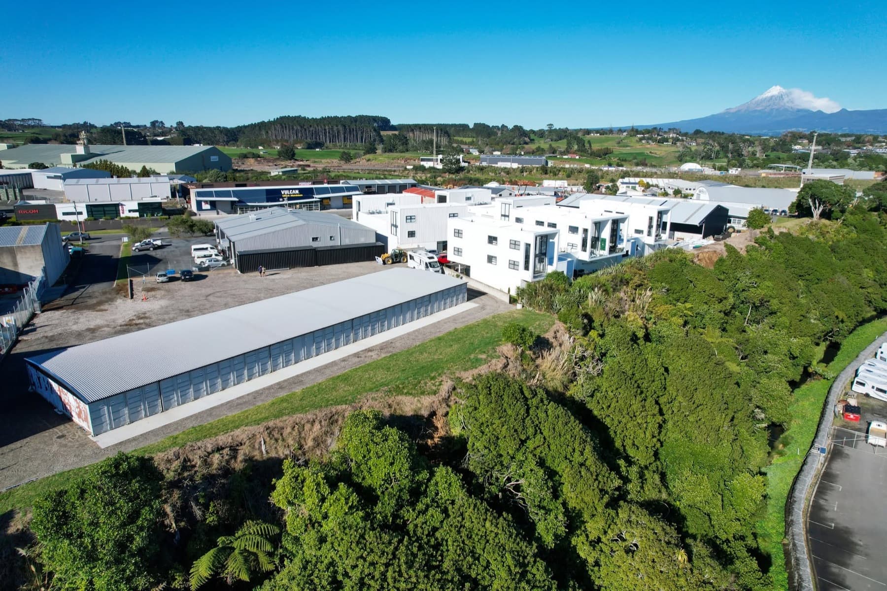 Still Storage's roofed container yard in New Plymouth with Taranaki Maunga on the skyline